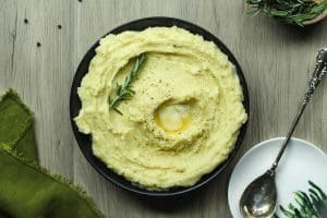 Rosemary Garlic Mashed Potatoes in a black bowl.