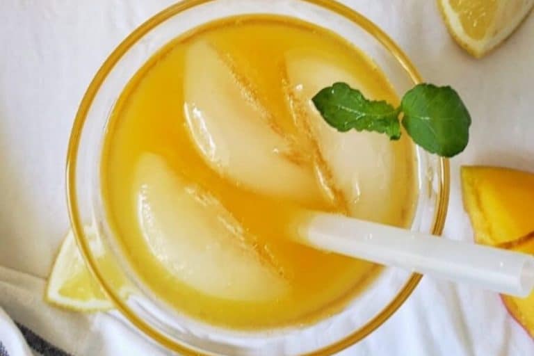 Mango Lemonade with Ginger and mint garnish vegan drinks.