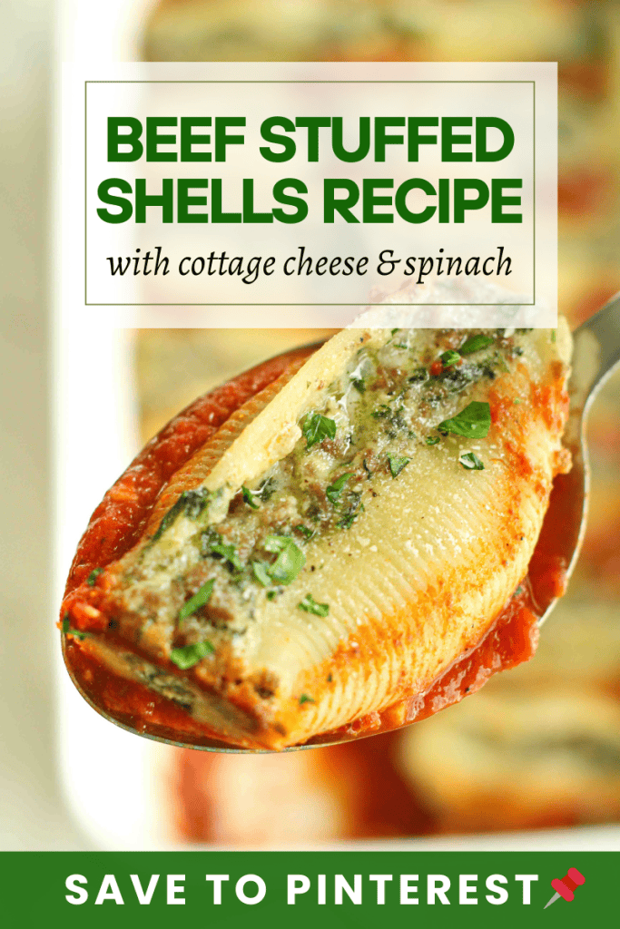 Save to pinterest: beef stuffed shells with cottage cheese and spinach with one shell on a spoon with marinara sauce.
